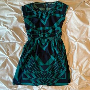 Cap sleeve mini dress cinched waist in geometric teal and navy pattern medium